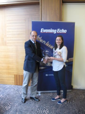 Phil Healy being presented with her award by liam O'Brien, Chairman of Awards Selection Committee, Cork City Sports