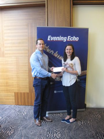Phil Healy being presented with her Leisureworld Membership by Ian O'Leary, Marketing Manager, Leisureworld