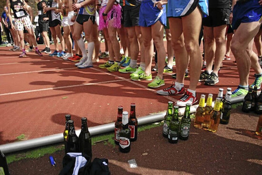 runner drinking alcohol